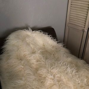 Faux fur throw in cream white